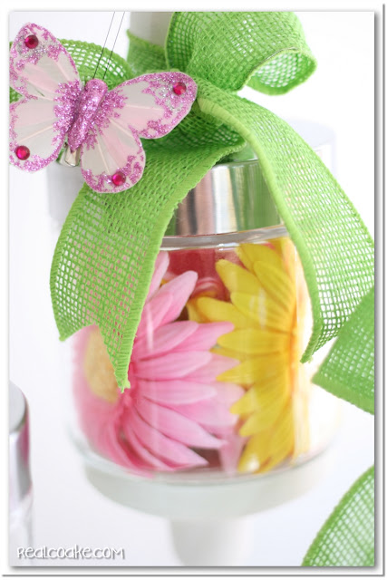 Spring decorating ideas using cute Apothecary Jars. #ApothecaryJars #Spring #Decorating