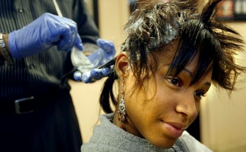 Woman getting black hair dye