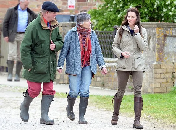 Kate Middleton wore Troy London Wax Parka, Jigsaw Cashmere Jumper, Zara Trousers, Penelope Chilvers boot, Kiki Lauren Earrings