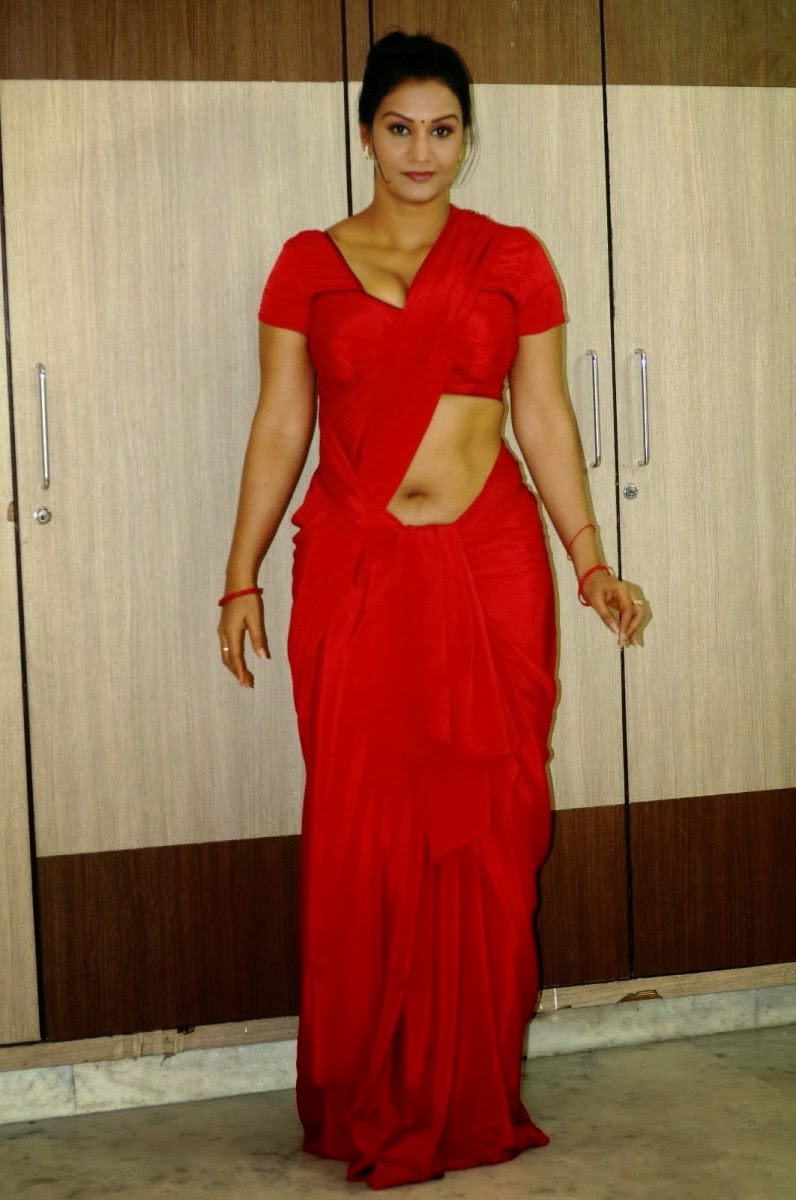 Actress Apoorva Hot Navel Show in Red Saree Photo Gallery