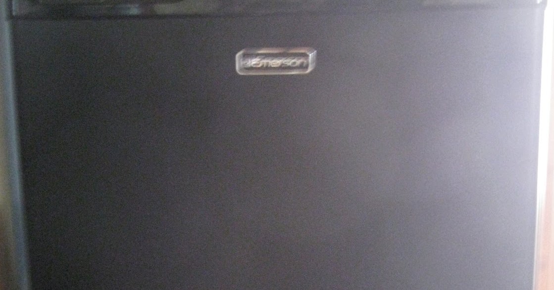 Little Tinker Fixing an Emerson mini refrigerator