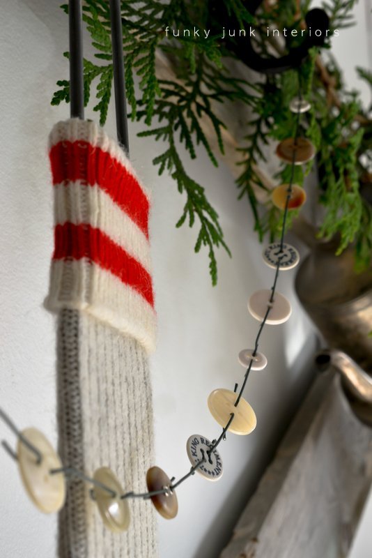 Learn how to make a super simple and adorable button garland for Christmas decorating! All you need are buttons and ornament hooks!