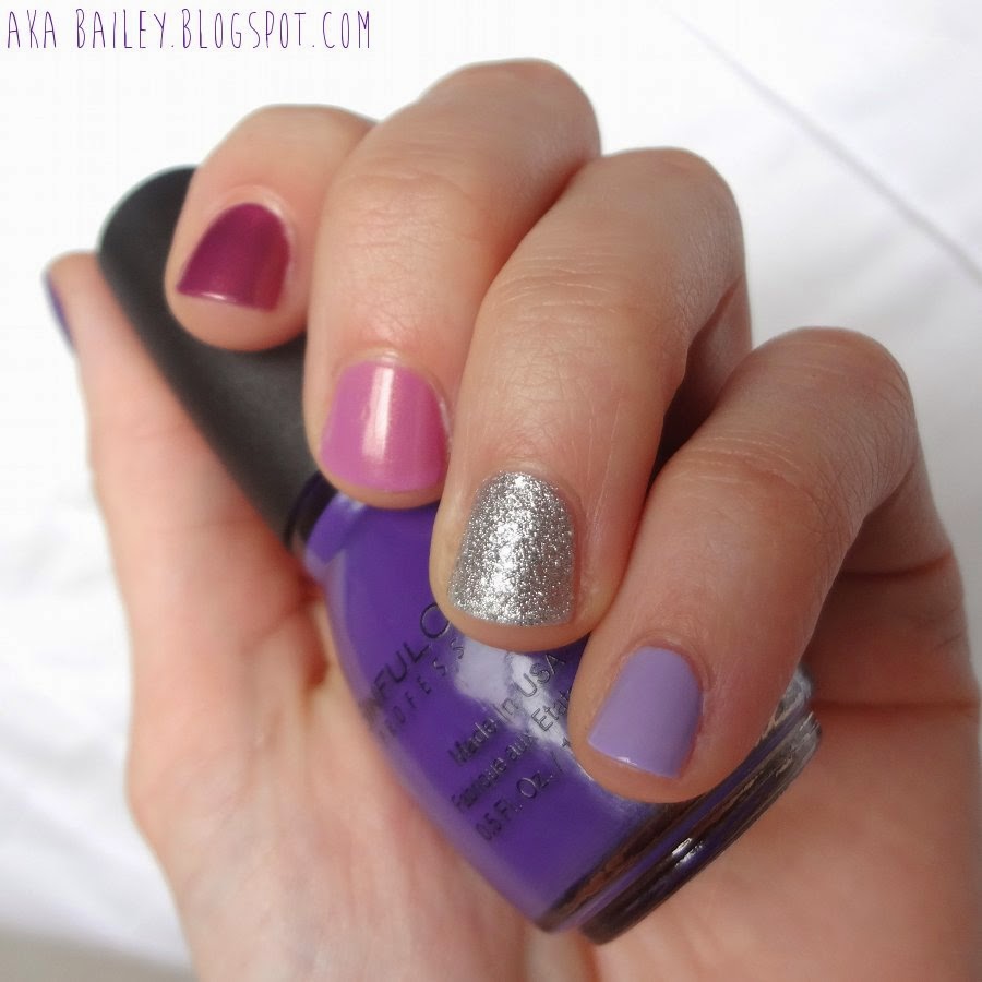 Purple nail polishes with a silver glitter accent nail