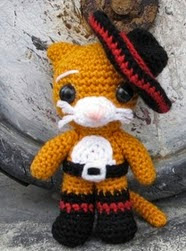 http://translate.google.es/translate?hl=es&sl=en&tl=es&u=http%3A%2F%2Flittleyarnfriends.com%2Fpost%2F85005698331%2Fcrochet-pattern-lil-puss-in-boots