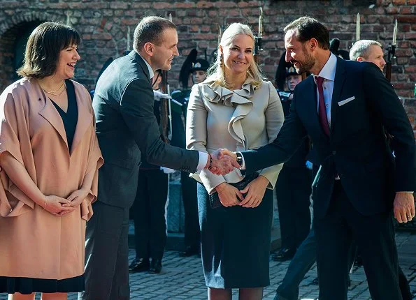Crown Princess Mette-Marit, Gudni Johannesson and Eliza Reid at the Akershus Fortress. Crown Princess Mette Marit wore Valentino Ruffle trimmed wool and silk blend jacket