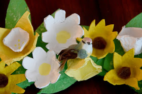 small bird resting on flowers for egg carton wreath
