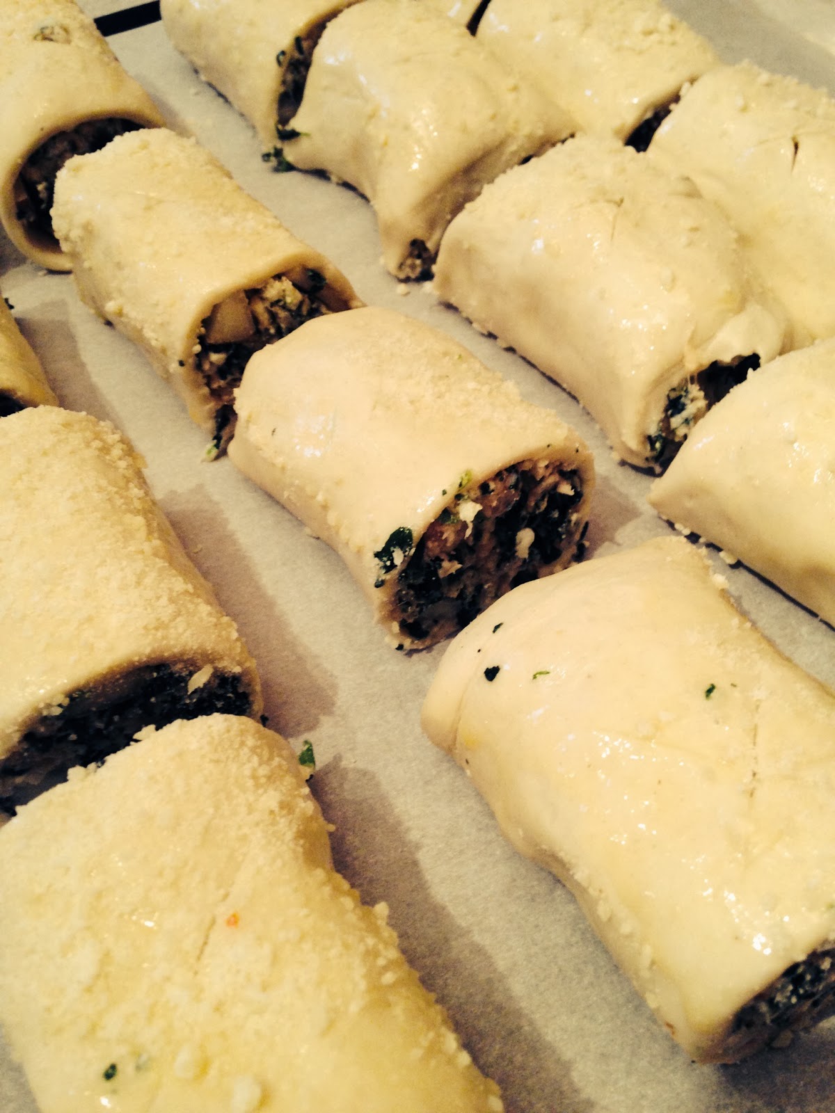 Sweet Alchemy Pork, spinach, feta and pear sausage rolls.
