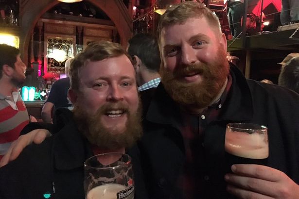 Wow! Two identical bearded strangers meet on a plane