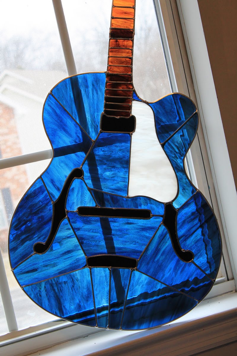 hear-the-raven-s-call-stained-glass-guitar-project