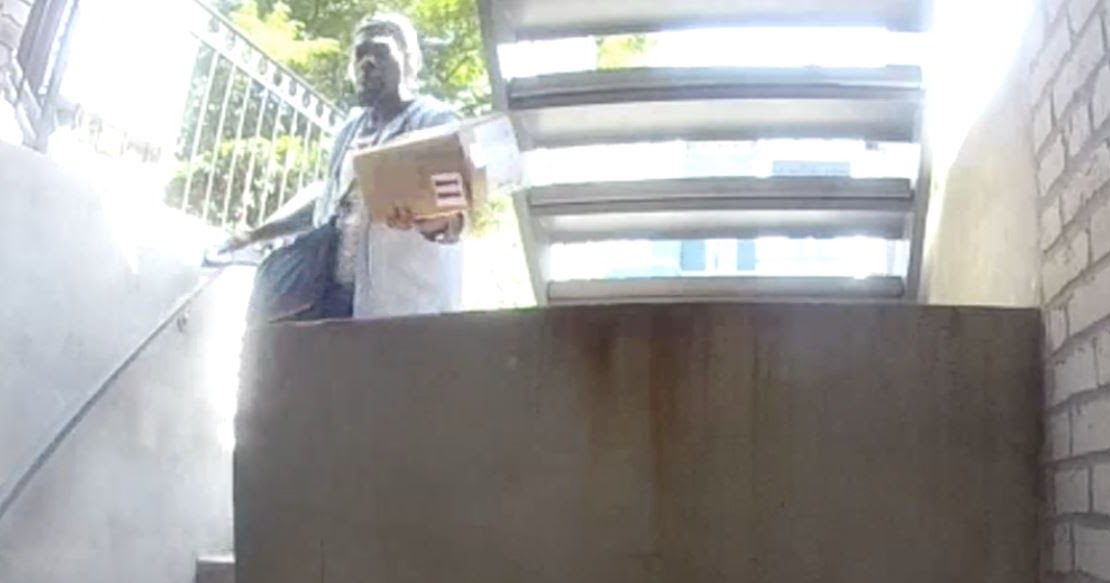 bloomingdale package marked "to be placed upright & handled with care