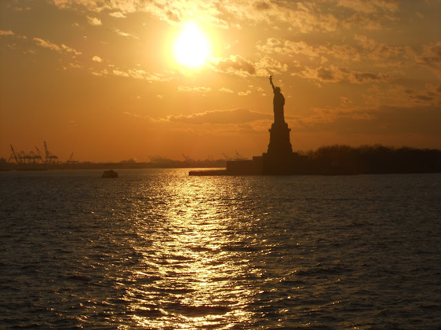 New York CIty Statue of Liberty sunset boat