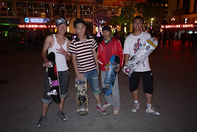 four Chinese skateboarders