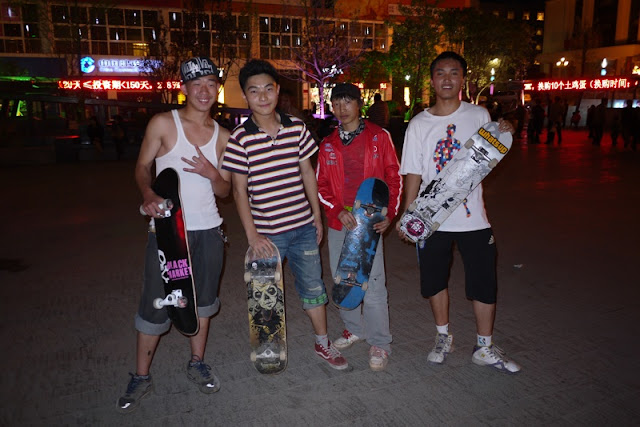 four Chinese skateboarders