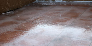 A sheet of ice over the tiles A sheet of ice over the tiles