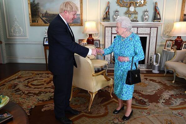 Queen Elizabeth II met with, new prime minister Boris Johnson. Meghan Markle, Kate Middleton
