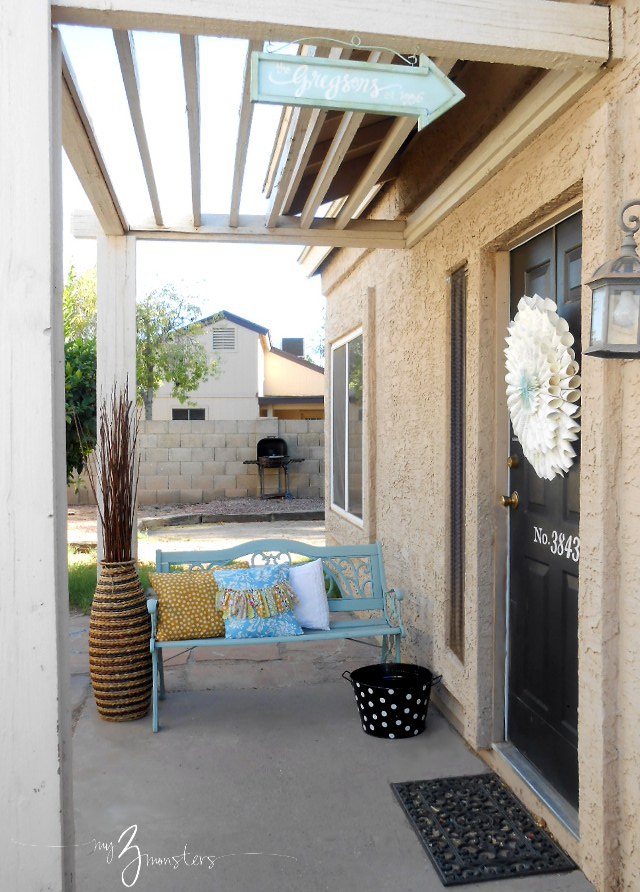 Finished Front Porch Mini-Makeover Adding some warmth to your front porch with pillows and accessories at /