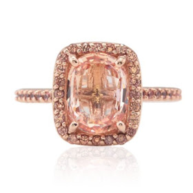 The gorgeous peach orange hue of a Padparadscha sapphire. Image from Laurie Sarah Designs
