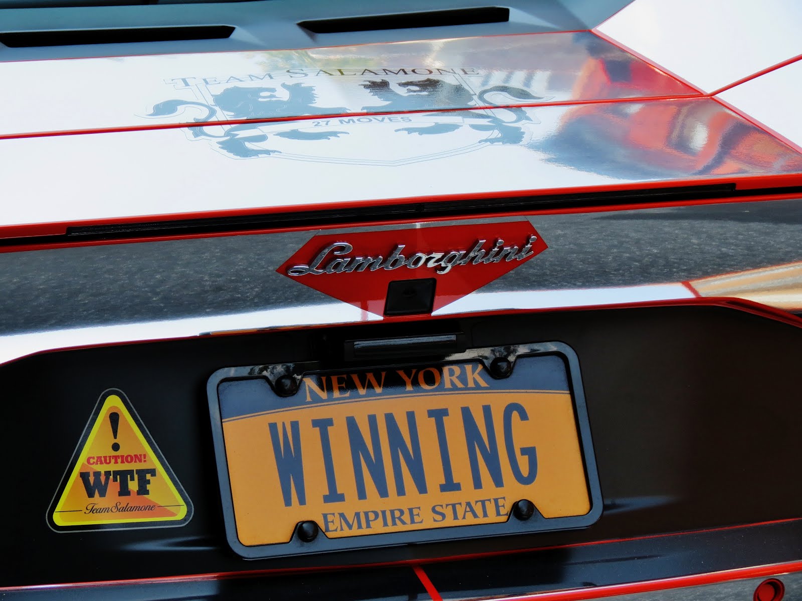 Today in photos of a Lamborghini with a 'WINNING' license plate o...