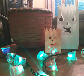 Make your own homemade holiday light covers for Halloween.