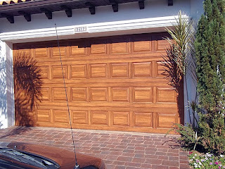Paint a garage door to look like wood