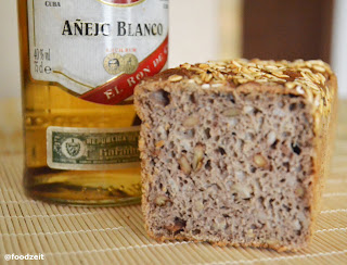 Bread cut open showing the crumb, the nuts and seeds