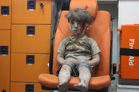 SYRIAN BOY, A DISPLAY OF UNCANNY COURAGE.