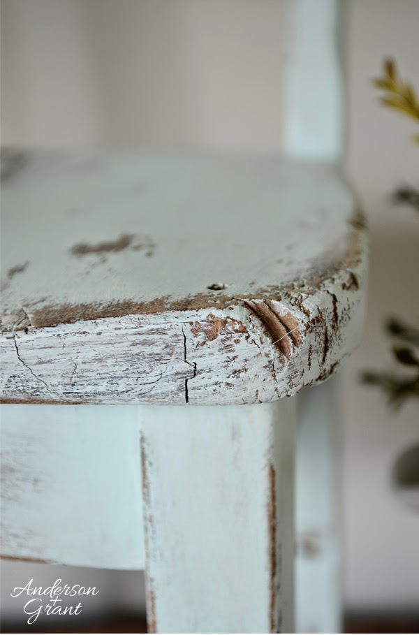 Corner of hand painted and distressed kid's chair from www.andersonandgrant.com