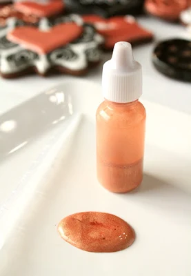 Rose gold airbrush spray and plastic dropper