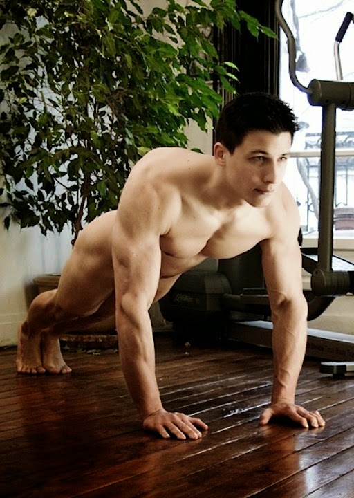 Naked shirtless fitness man doing push ups