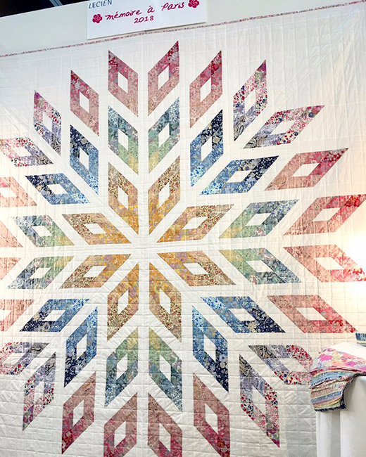Memoire a Paris Lone Star Quilt Free Pattern designed, created, & quilted by Lynne Goldsworthy for Lecien, featuring “Memoire a Paris”, displayed in Portland at Spring Quilt Market 2018