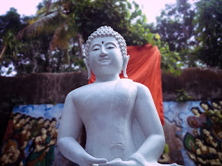 White Buddha Statue Under The Bodhi Tree At Brahmavihara Arama Monastery North Bali