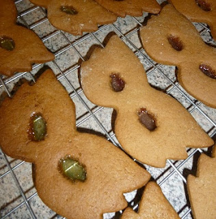 Picture of Christmas biscuits in super hero mask shapes with coloured eye holes from the boiled sweets Picture of Christmas biscuits in super hero mask shapes with coloured eye holes from the boiled sweets