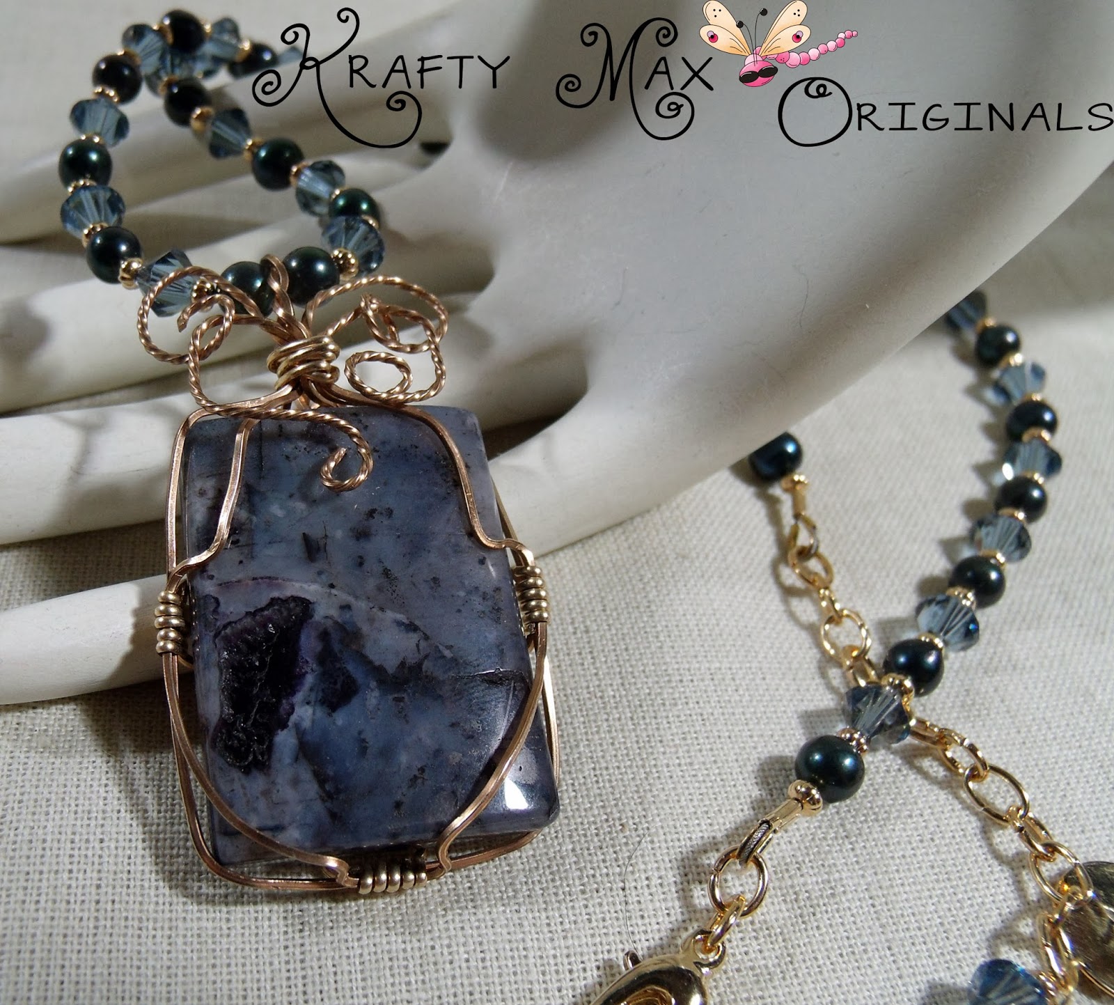 http://www.artfire.com/ext/shop/product_view/KraftyMax/8442337/swarovski_crystals_swarovski_pearls_and_blue_lapis_necklace_set/handmade/jewelry/sets/crystal