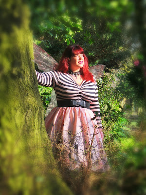 Big Fashionista in pink dress with wings