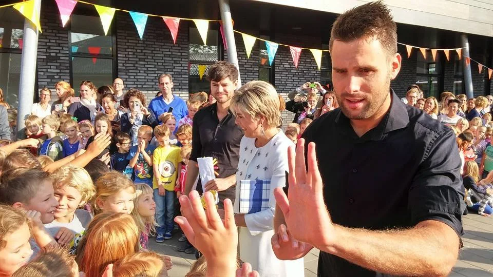 Princess Laurentien of The Netherlands starts with Dutch singers Nick and Simon the 20th edition of Edukans Schoenmaatje at the Brede school de Zandkampen in Zaltbommel, The Netherlands