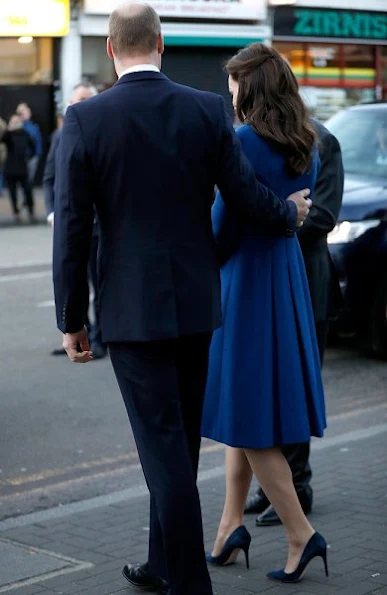 Kate Middleton wore Eponine London Belted Coat, Russell and Bromley Clutch, Gianvito Rossi Suade pumps