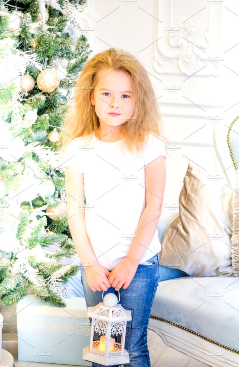 Cute girl and Christmas Tree People Images Creative Market Cute girl and Christmas Tree People Images Creative Market