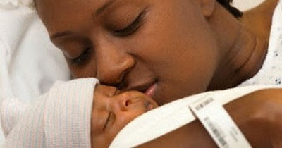 Black mother with her baby
