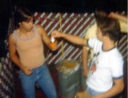 1976/1977 Joey on the right handing me a Miller nip beer later that night at Ronnies 17th B-Day party 1976/1977 Joey on the right handing me a Miller nip beer later that night at Ronnies 17th B-Day party
