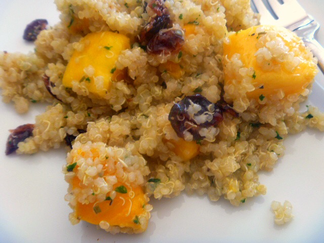 Quinoa Mango Salad: This salad is filled with healthy goodness such as quinoa, mangoes and cranberries and doused with a light white wine vinaigrette that brings it all together. - Slice of Southern