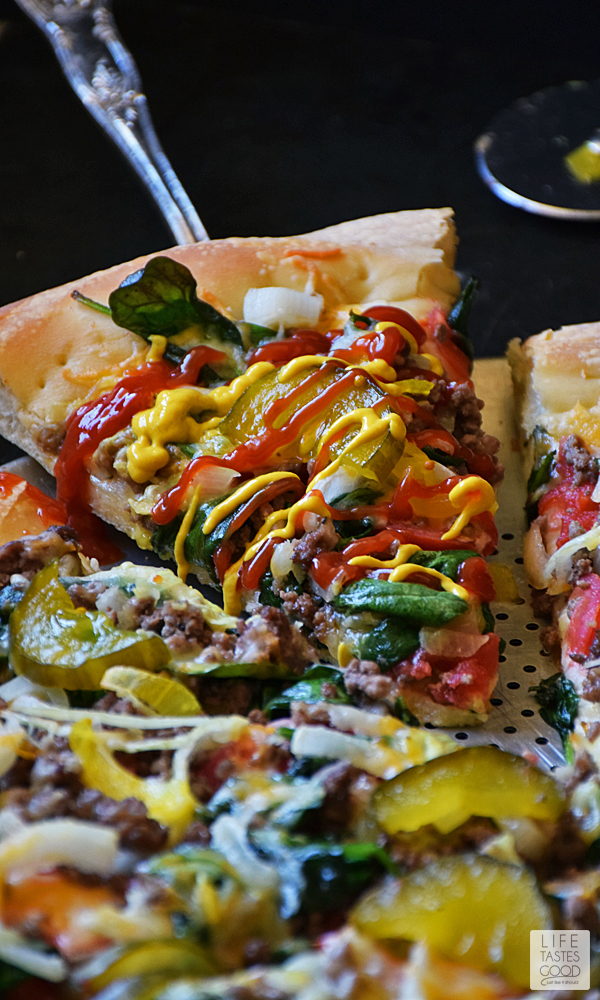 Cheeseburger Pizza Recipe | by Life Tastes Good takes everything I love about a big, juicy cheeseburger and plops it on top of a thick, delicious pizza crust for a tasty game day treat or a quick and easy dinner the whole family will love! #LTGrecipes #SundaySupper