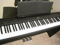 Kawai ES100 cabinet digital piano