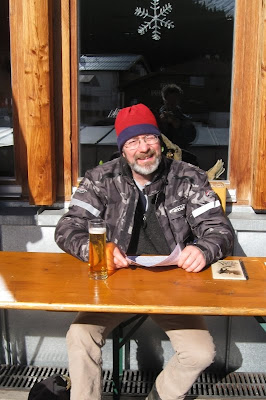 A cheery Mr A with a beer in the sunshine