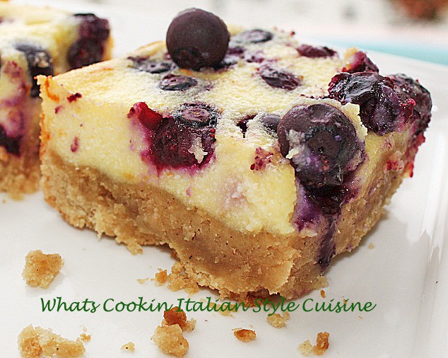 these are a blueberry cheesecake bar. The blueberry bar is a square baked into a rectangular pan with a crust made with oatmeal. The batter is easy and pour over the crust and blueberries are on top of the filling and baked throughout the cheesecake. An easy cheesecake baked with blueberries.