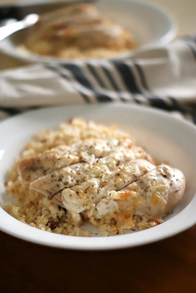 This Parmesan Chicken and Cauliflower Couscous that comes together in just 30 minutes is perfect for meal prepping!  By prepping four lunch-sized portions in advance, you are setting yourself up for success by making it easy to make a healthy choice.