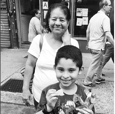 Woman and Boy Wait for the Parade at Queens Pride 2018