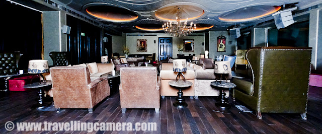 'The garden of Gastronomy' - This is how Mail Today introduces LAP club !Indian Express say following about LAP Club - 'Weekends in Delhi will never be the same again'Few other compliments about the place include - 'Find yourslef in LAP of luxury' and 'Delhi's has never seen anything like this before'This is one of the photographs from interiors of LAP Club and every piece of furniture is designed exclusively for LAP Club. Most of these art peices are designed by known personalities from various parts of the country and outside India.This club is only accessible to members and I have heard that getting membership of LAP is not very easy.HT City calls LAP as - 'Quite a Night Out'Mail Today also call it as - 'LAP IT UP with a good food menu'Bollywood actor Arjun Rampal owns this wonderful club !!!Arjun Rampal in association with restaurateur A.D. Singh opened LAP in Delhi, which is considered as a great place to party...There is more than enough staff at the club for better service and maintaining the place. Guests of the club are really happy with the fact that service is very quick due to large number of waiters and support staff there.Overall interior of the place is mind blowing. They have kept very minor details in mind.. Lighting is fabulous !!!There are different sections at LAP club. So it's your choice about the seating... Round sofas, golden chairs or over-sized sofas :Here is one of the sections with huge golden chairs and Swarovski studded table with wine glasses on top of it !!! Please ignore extra light lying on one of the cube... And if you tend to think about these photographs... these are all casual shots which are clicked in a hurry for checking the perceptive and no external lights were used.... Actual Photographs will need more to time  and can be seen on official website of LAP Club !!!Here is another seating area, which is only elevated area and seems most special of all :) ... Although all the sections are unique and specialties each section suite to different personalities... So there is nothing like better or best kind of thing :Here is a view of main bar inside LAP club, Samrat Hotel, Delhi. Note the shining cushions and a small cylindrical seat... All these shining things are Swarovskis ...There is a beautiful garden in this club with wonderful lighting during the evenings and this water fountain is there in the middle of this garden !One of the video of LAP, which I could find on Youtube