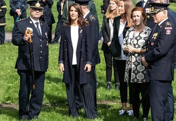 Princess Marie attended Danish Emergency Management Agency's 40th anniversary events in Gråsten. wore coat and trousers