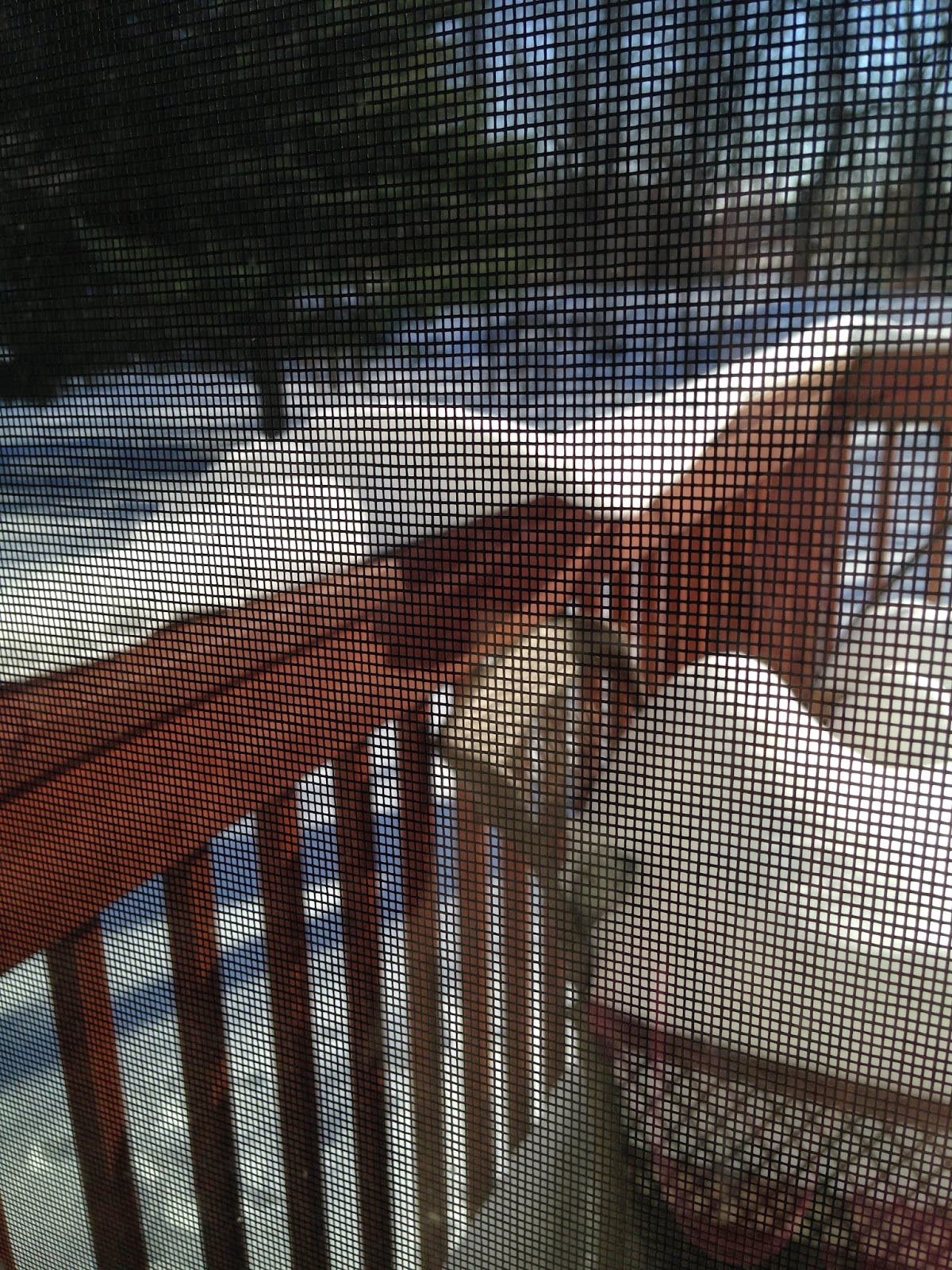 snow collapsing from porch railing