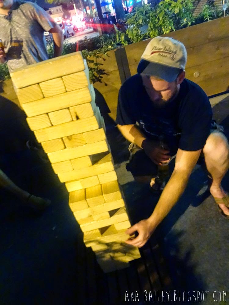 Playing Giant Jenga at Brass Union in Somerville